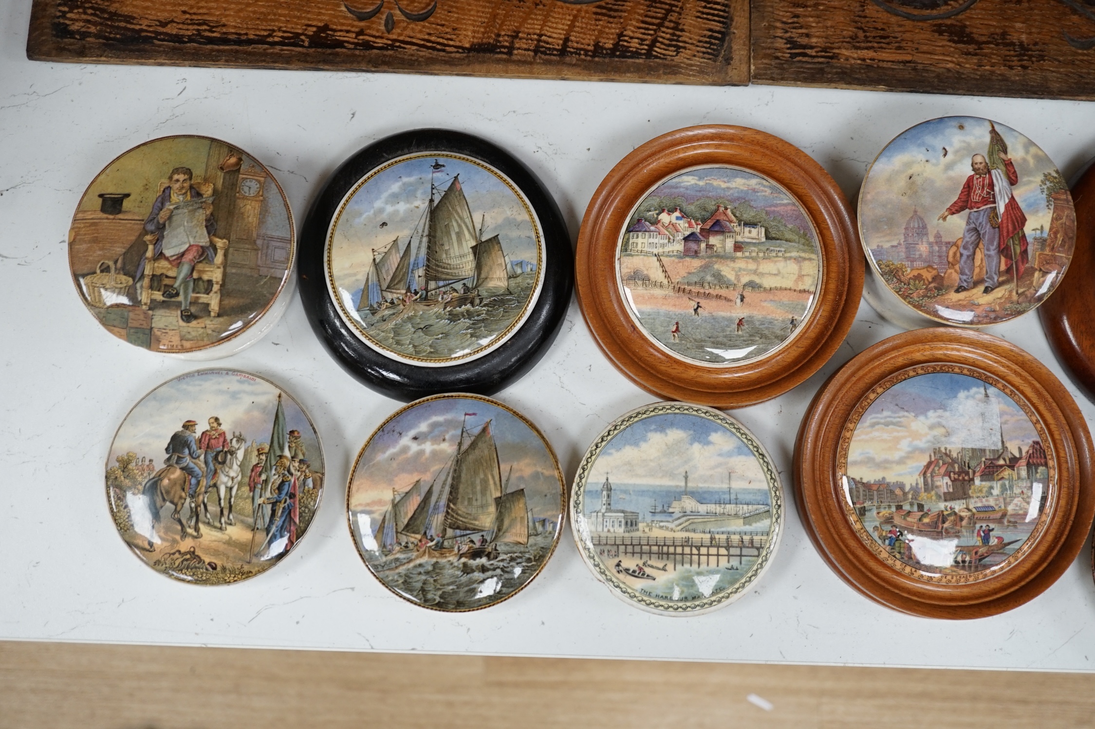 Eleven 19th century mostly framed pot lids including ‘The Ning Po River’, ‘Rifle Contest Wimbledon 1868’, ‘Vue De La Ville De Strasbourg Prise De Port’ etc. Condition - fair to good